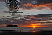 Costa Rica. Pacific coast, Puntarenas province, Manuel Antonio, Playa Espadilla beach at sunset, back islas Gemelas, Latin America