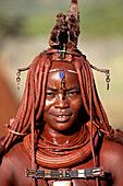 Himba woman with the typical ornaments, near to Epupa Falls, Kaokoland, Namibia.