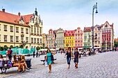 People walking in the Old Town, Market Square, Wroclaw, Poland, Europe, Summer 2015