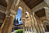 Arabesque Moorish architectureof the Patio de los Leones (Court of the Lions) of the Palacios Nazaries, Alhambra. Granada, Andalusia, Spain.