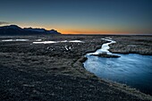 Black sands and river, Hoffellsjokull glacier in the background, Hornafjordur, Iceland