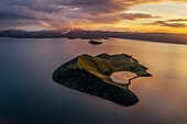 Aerial of a small island named Sandey in Thingvallavatn or Lake Thingvellir, Thingvellir National Park, Iceland.
