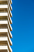 The elegant front of a typical high rise residencal building, Malaga, Andalusia, Spain