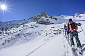 Two persons back-country skiing ascending to Breitenstein, Breitenstein, Chiemgau Alps, Chiemgau, Upper Bavaria, Bavaria, Germany