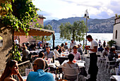 At the seafront of Malcesine, eastern shore, lake Garda, Veneto, Italy