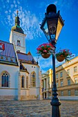 'The colourful Church of St. Mark is one of the oldest buildings in Zagreb and of its symbols. It is first mentioned in the list of parish churches in the Kaptol Statute of 1334.It was built in the 13th century; from that first, Romanesque period, only a 