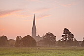 Salisbury cathedral at sunrise.