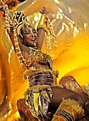 Brazil, State of Rio de Janeiro, City of Rio de Janeiro, Samba Dancer in the Carnival Parade at The Sambadrome Marques de Sapucai..