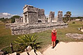 Tourists in Mayan Ruins at Maya archeological site of Tulum, Quintana Roo, Yucatan Province, Mexico, Central America.