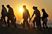 Sunset. People. Dune of Pilat or Pyla (French: Dune du Pilat, official name), is the tallest sand dune in Europe. It is located in La Teste-de-Buch in the Arcachon Bay area, in the Gironde department, in Aquitaine region, southwestern France.