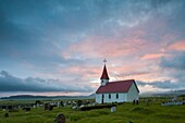 Sunset at Reyniskirkja church near Vik, Iceland.