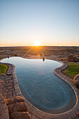 A swimming pool on the edge of the desert at Canyon Lodge near the Fish River Canyon, Namibia, Africa