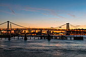 'Williamsberg Bridge at sunset; New York City, New York, United States of America'