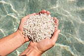 'Grains of quartz in Mari Ermi beach, also known as the beach of the grains of rice; Oristano, Sardinia, Italy'
