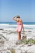 Woman walking on the beach