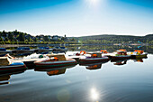 Morning atmosphere with rowing boats, lake Schluchsee, Black Forest, Baden-Wuerttemberg, Germany
