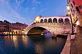Rialto Bridge is one of the four bridges spanning the Grand Canal in Venice, Italy.