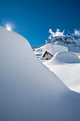 Valtellina, Lombardy, snowy chalet to Lendine alp, Chiavenna valley, Italy
