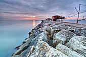 Europe, Italy, Veneto, Chioggia, Sottomarina. View of the Casoni, the stilt house of fishermen on the sea