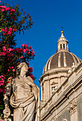 statues of the cathedral of Catania and the dome of the abbey of s.agata, Catania, Sicily, Italy, Europe