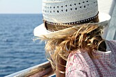 Blond girl on board Cinque Terre La Spezia Italy.