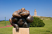 Spain, Galicia, La Coruna, The Guardian, sculpture by Ramon Conde in front of Torre de Hercules (Hercules Tower)