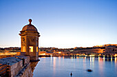 Malta, the Three Cities, Observation tower of Senglea with the city of Valletta, listed as World Heritage by the UNESCO, in the background