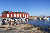 Marina with red huts on the isle Hoenoe, Bohuslaen, Vaestra Goetaland County, Archipelago of Gothenburg, Scandinavia, South Sweden, Sweden,  Northern Europe