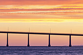Red sky over Baltic Sea and the bridge of Langeland, Rudkøbing, Island Langeland, Danish South Sea Islands, Southern Denmark, Denmark, Scandinavia, Northern Europe