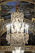 France, Yvelines, Chateau de Versailles, listed as World Heritage by UNESCO, Galerie des Glaces (Hall of Mirrors), architect Jules Hardouin Mansart (1678-1684), detail of a ceiling light