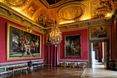 France, Yvelines, Chateau de Versailles, listed as World Heritage by UNESCO, Les Grands Appartements (State Apartments), Mars drawing room with King Louis XV painting by Van Loo on the right in the background