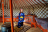 France, Lozere, Aumont Aubrac, a young Mongolian woman welcomes you and makes you discover the Mongolian customs