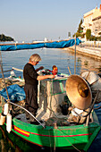 Croatia, Istria, Adriatic Coast, the city of Rovinj, a fisherman
