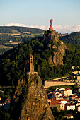 France, Haute Loire, Le Puy en Velay listed as World Heritage by UNESCO, the town is a stopover along the pilgrims' route to Santiago de Compostela, St Michel d'Aiguilhe Rock in the foreground
