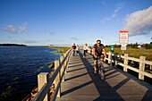 Canada, New Brunswick, the Acadian coast, Shippagan, the wodden promenade, cyclists