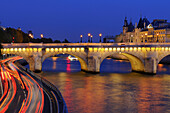France, Paris, area listed as World Heritage by UNESCO, the pont Neuf and the Conciergerie illuminated
