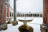 France, Yvelines, snow covered park of the Chateau de Versailles, listed as World Heritage by UNESCO, round peristyle by Mansart