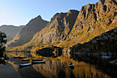Norway, Nordland County, Lofoten Islands, town of A (Å) at the end of Moskenes, boats on a small lake