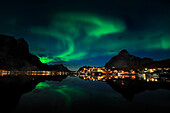 Norway, Nordland County, Lofoten Islands, Moskenes Island, aurora borealis over Reine fishermen village