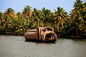 India, Kerala State, Allepey, the backwaters, houseboats (old transport barge converted for the touristic cruising of the canals)