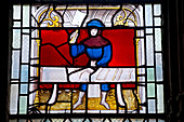 France, Cote d'Or, Semur en Auxois, Notre Dame, the 15th century stained glass representing guilds, butchers