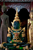 Laos, Luang Prabang listed as World Heritage by UNESCO, numerous statues of buddha are housed in the sanctuaries of the temples