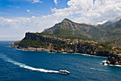Spain, Balearic Islands, Majorca, Puerto Soller, looking down on the coast and lighthouse