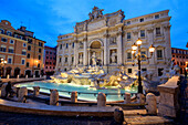 View of Trevi Fountain illuminated by street lamps and the lights of dusk, Rome, Lazio, Italy, Europe