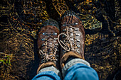 Boots in a stream, Cumbria, England, United Kingdom, Europe