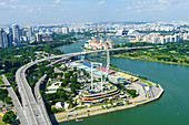 High view over Singapore with the Singapore Flyer ferris wheel and ECP expressway, Singapore, Southeast Asia, Asia