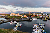 The harbor town of Stykkisholmur as seen from the small island of Stykkia on the Snaefellsnes Peninsula, Iceland, Polar Regions