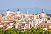 Churches and domes of the Rome skyline showing Victor Emmanuel II monument in the distance, Rome, Lazio, Italy, Europe