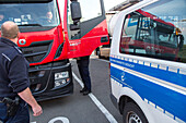German Autobahn, truck stopped by  Autobahn police patrol, halt, stop, security, check, patrol, motorway, highway, freeway, speed, speed limit, traffic, infrastructure, Germany