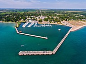 Aerial view of a Small town man made harbor on Lake Huron at Port Sanilac Michigan on Lake Huron